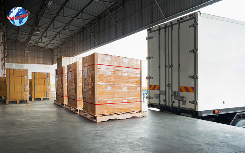 Pallets of boxes being transported via freight truck