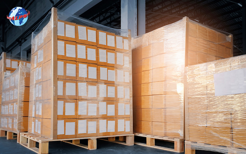 Shrink wrapped packages on pallets sitting in a warehouse